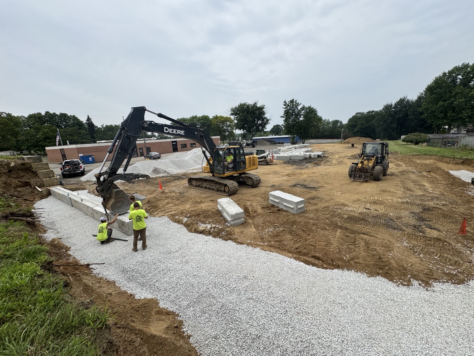 Stone base and foundation work during construction of PROFLEX commercial flex space in Akron